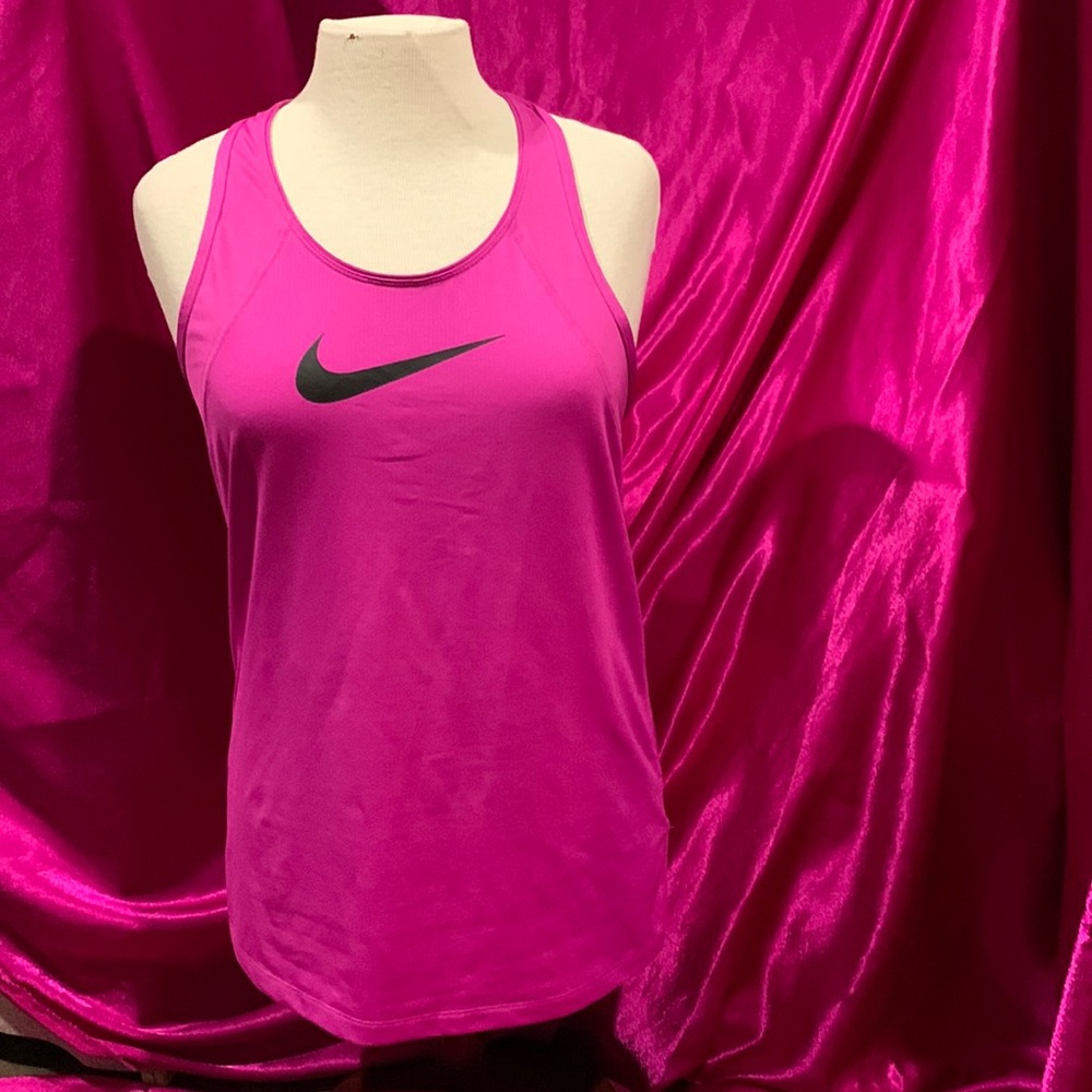 Nike dry fit size small. Great condition. Black and Fuchsia